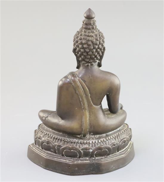 A Thai brown patinated bronze seated figure of Buddha H. 20.5cm